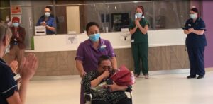 Senior Sister Ayesha Orlanda is clapped out of the building after recovering from Covid-19