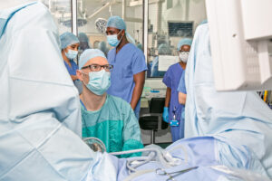 Consultant Colo-Rectal Surgeon Jon Robinson pictured during an operation