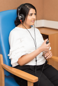 Woman using a hearing device