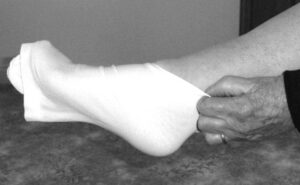 stocking over foot and heel