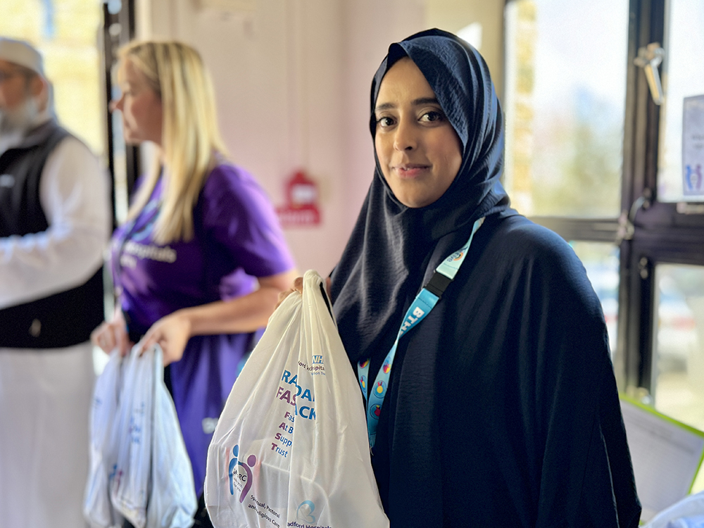 IMG_9794 - SM A Muslim faith practitioner with a FAST pack bag in the prayer facility.